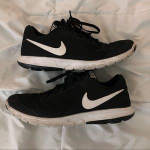 Black Nike athletic shoes
